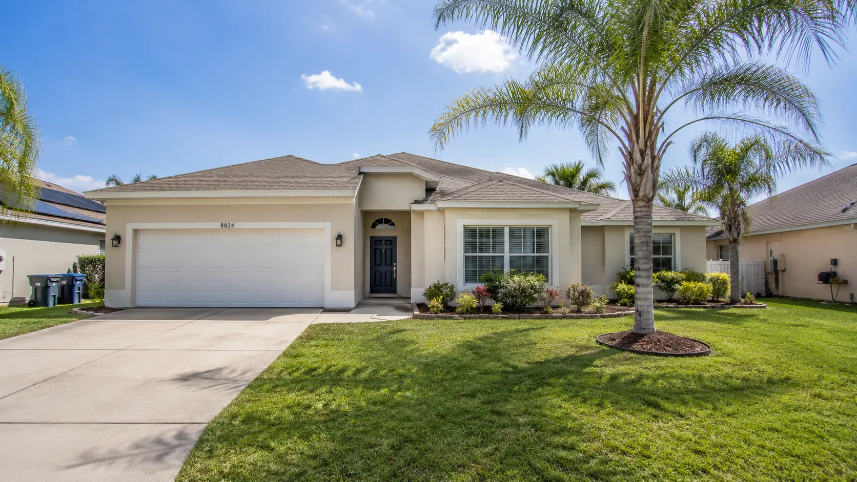 Beautiful backyard pool home in Oviedo Florida with tropical landscaping