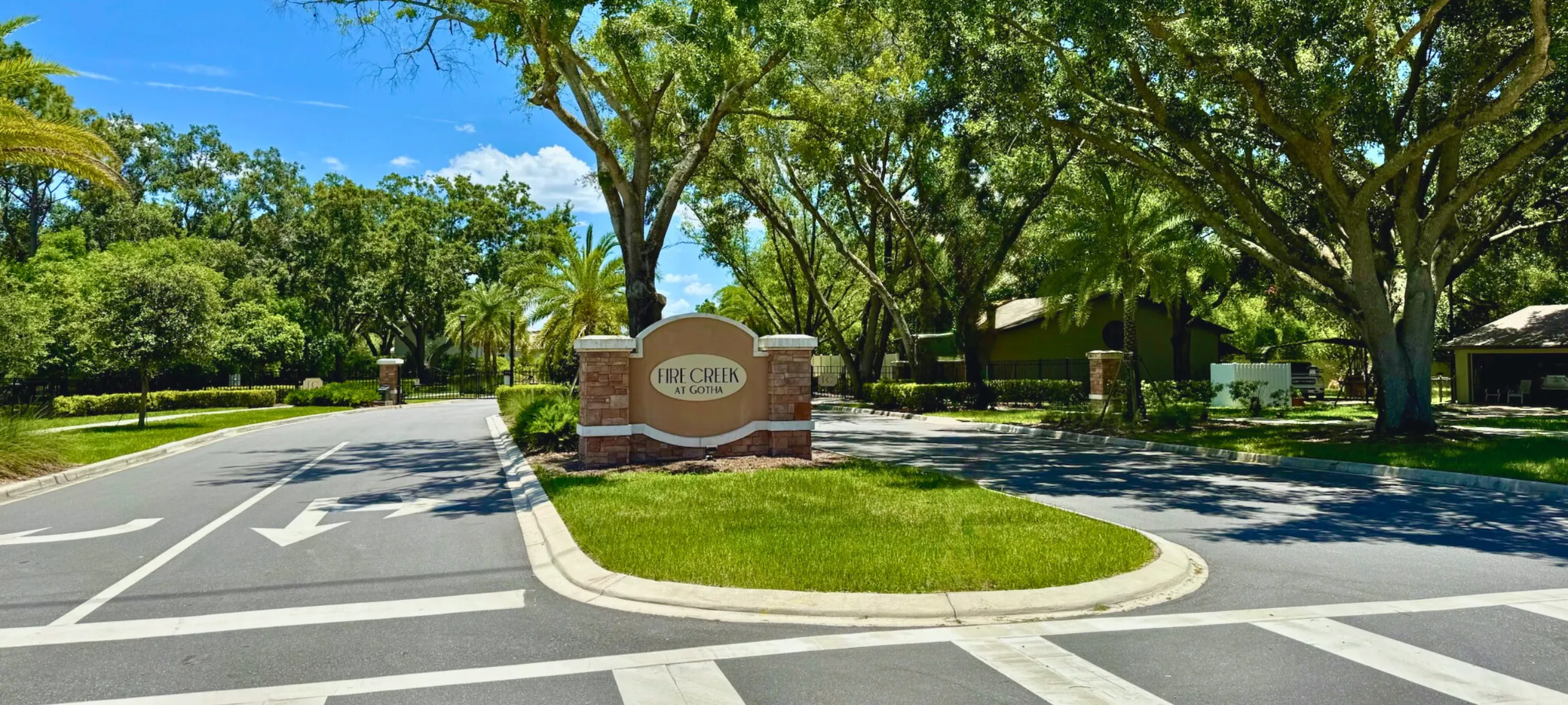 Fire Creek entrance in Gotha Florida with tree-lined streets and quiet residential setting