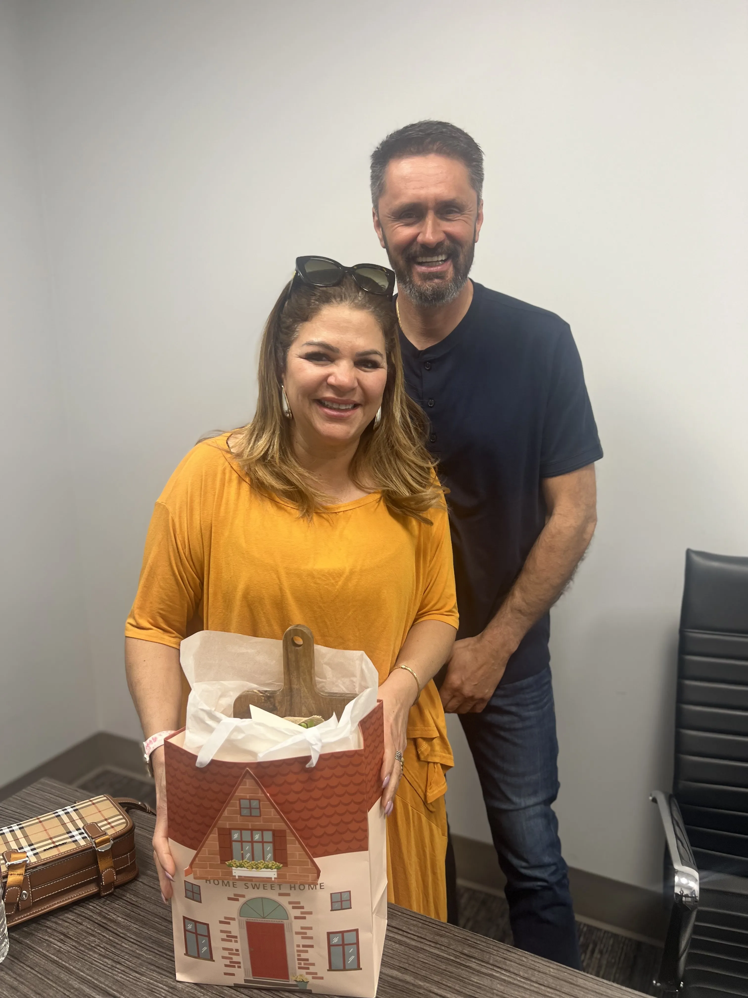 Happy clients after closing on their Orlando home