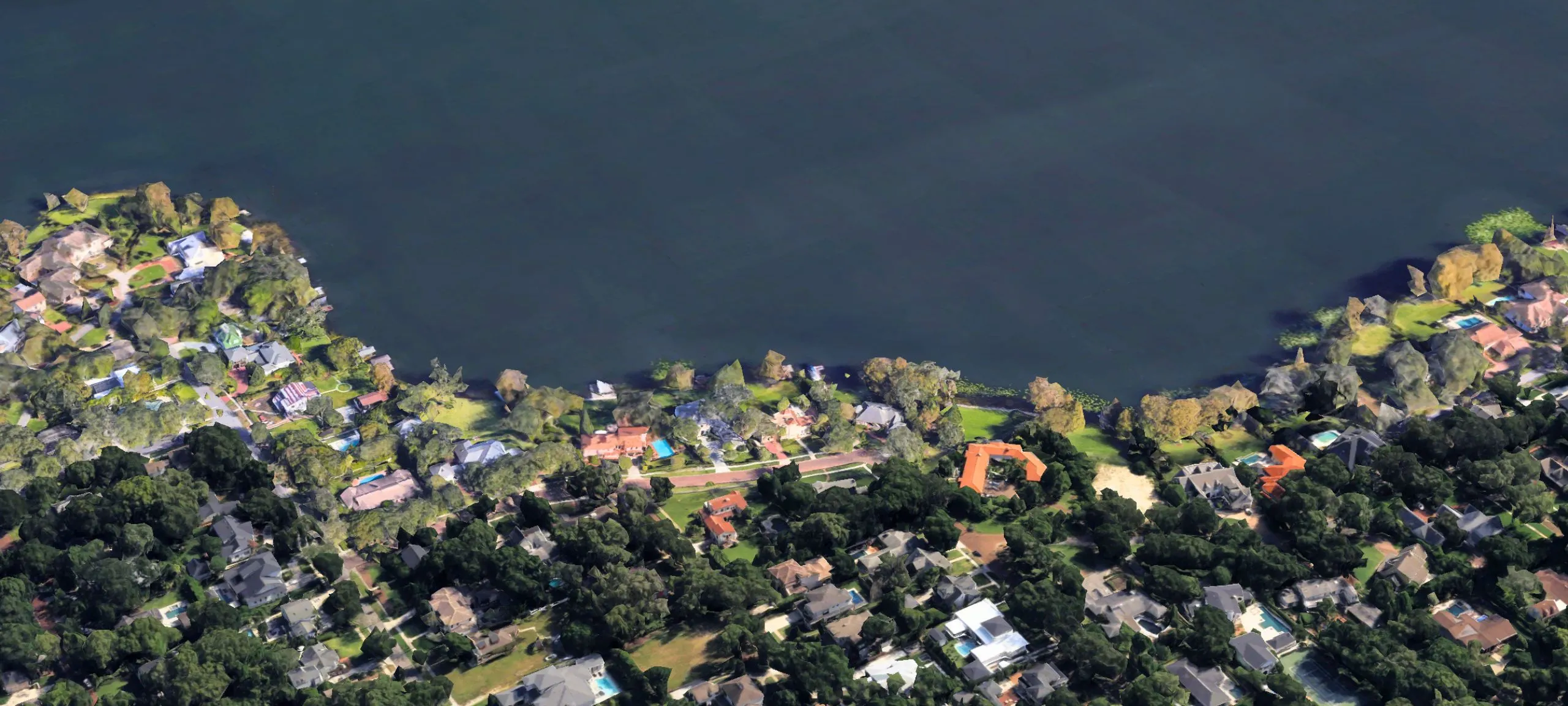 Aerial view of lakefront luxury homes with docks on Lake Butler near Windermere Florida