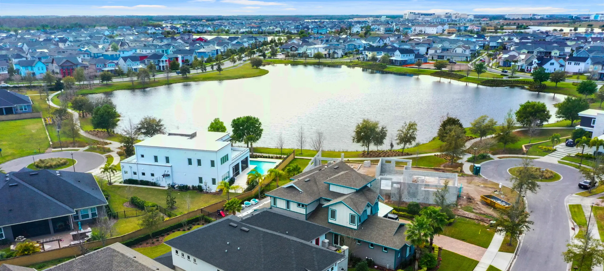 Colorful modern homes and sidewalks in Laureate Park Lake Nona Orlando